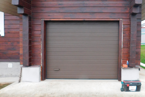 секционные ворота установка зимой